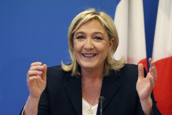 France's National Front political party head Marine Le Pen speaks during a news conference at the party headquarters in Nanterre near Paris