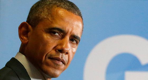 President Barack Obama listens as British Prime Minister David Cameron speaks during a news conference at the G7 summit in Brussels, Belgium, Thursday, June 5, 2014. (AP Photo/Charles Dharapak)