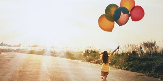 Girl with balloons