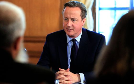 File photo dated 13/10/15 of Prime Minister David Cameron chairing the first meeting of his new Community Engagement Forum, as he has pledged £5 million of funding for groups trying to root out the