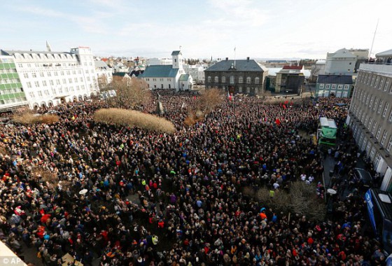 32D82CAF00000578-3524568-Thousands_gathered_in_the_centre_of_Reykjavik_to_call_for_the_Pr-a-10_1459864199788