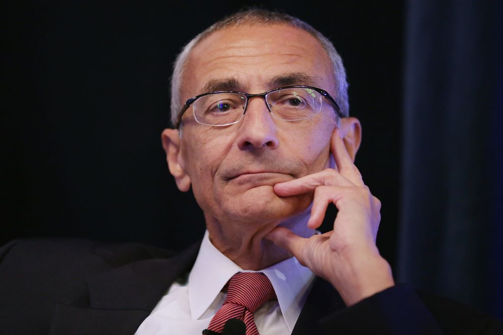 WASHINGTON, DC - OCTOBER 24: Center for American Progress Co-founder John Podesta moderates a panel discussion during a conference commemorating the 10th anniversary of the center at the Astor Ballroom of the St. Regis Hotel October 24, 2013 in Washington, DC. Former Clinton Administration Chief of Staff Podesta co-founded the liberal public policy research and advocacy organization as a think tank that rivals conservative policy groups, such as the Heritage Foundation and the American Enterprise Institute. (Photo by Chip Somodevilla/Getty Images)