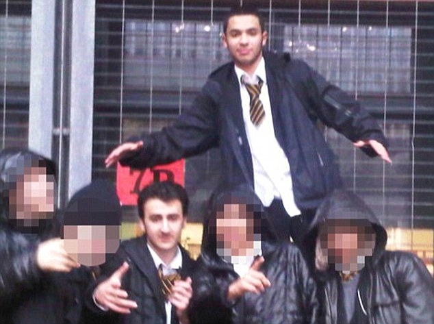 MUST PIXILATE FACE OF MAN IN THE CENTRE OF FRONT ROW Potential terror pic from school days ( Westminster City School ) ( Tarik Hassane, 21, known to friends as 'The Surgeon', top of pic) bottom row, left to right - Mohamed Fadhil, anfels pops , Suhaib Majeed, Bruddah Gus and Ali "Chubbez" El-Sayed. From open facebook link sent to picture desk by arthur martin